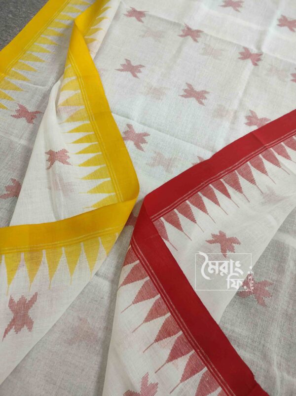 white monipuri saree. along with red& yellow border. with red sheuli thread design.